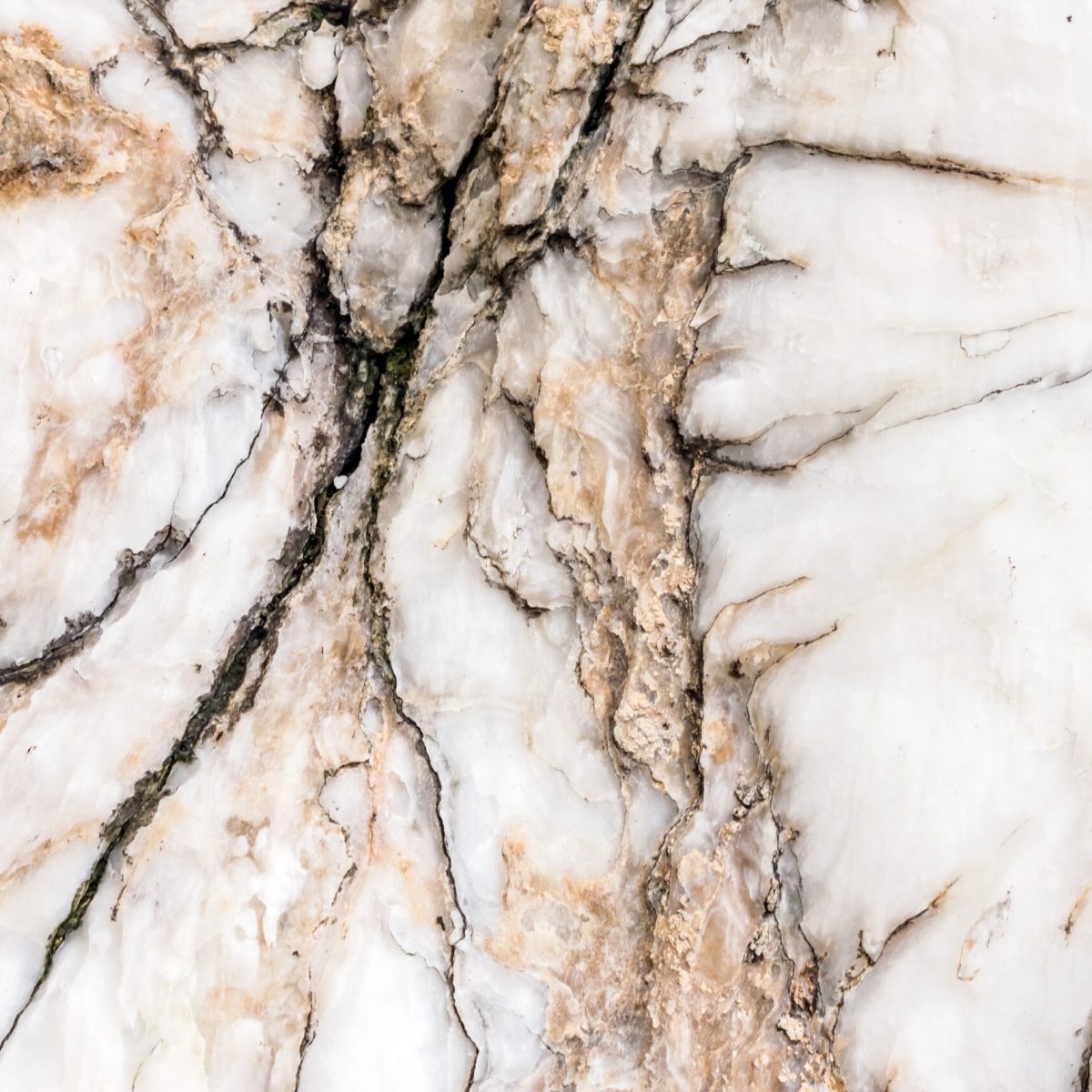 Natural unpolished White marble texture with dark pattern for background or design art work. Unprocessed surface of marble stone
