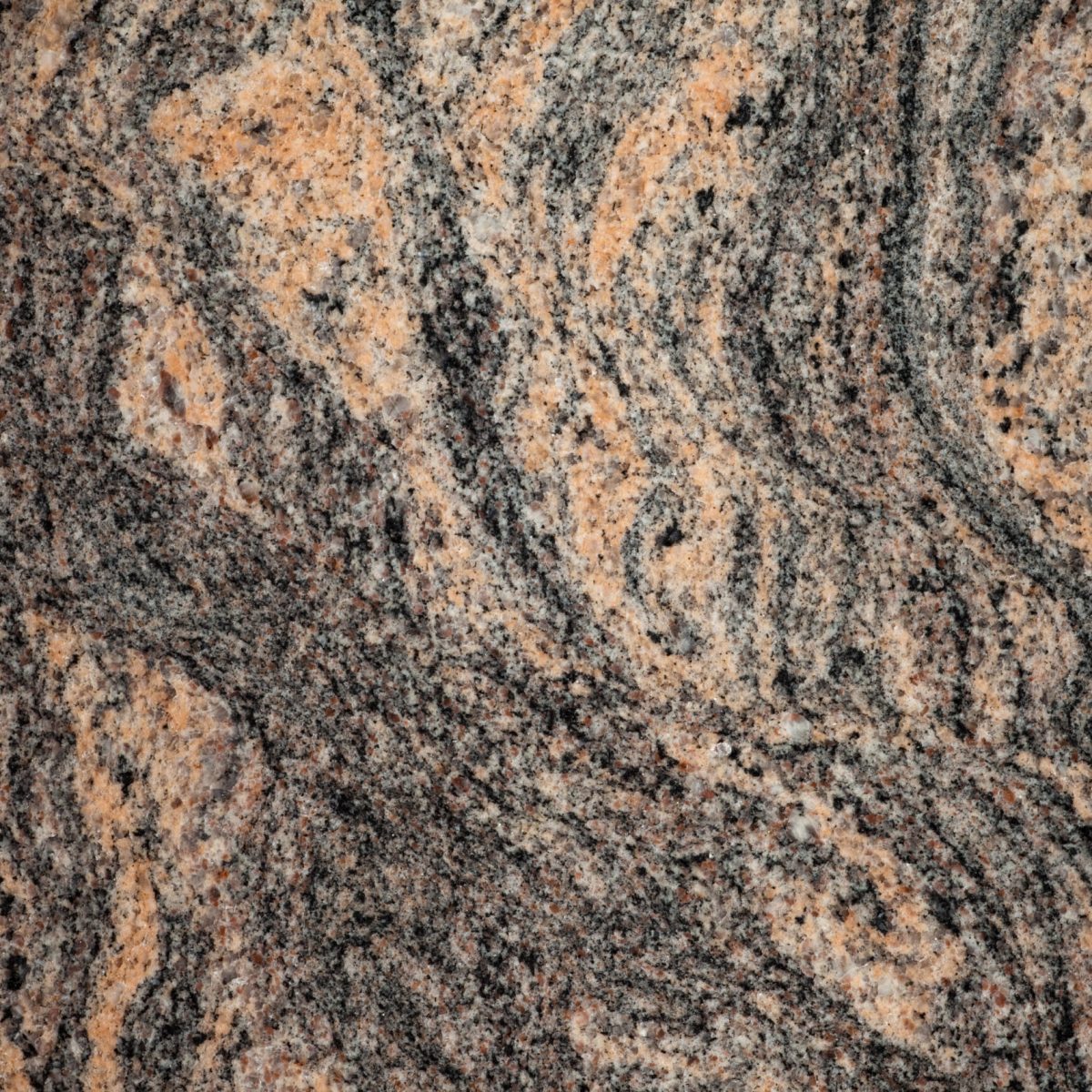 Close-up of beautiful natural texture of polished granite slab surface geology background